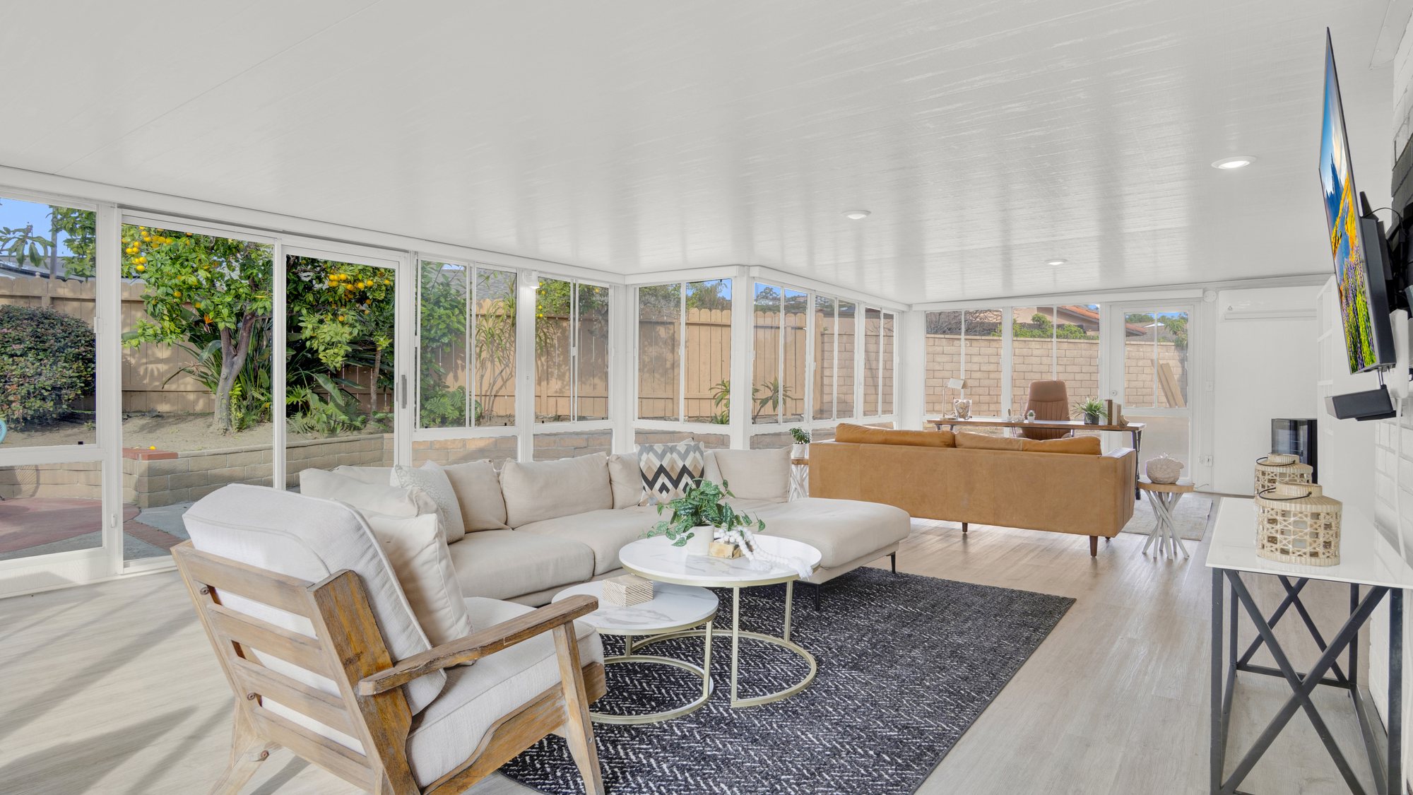 A bright staged sunroom ready for listing photos